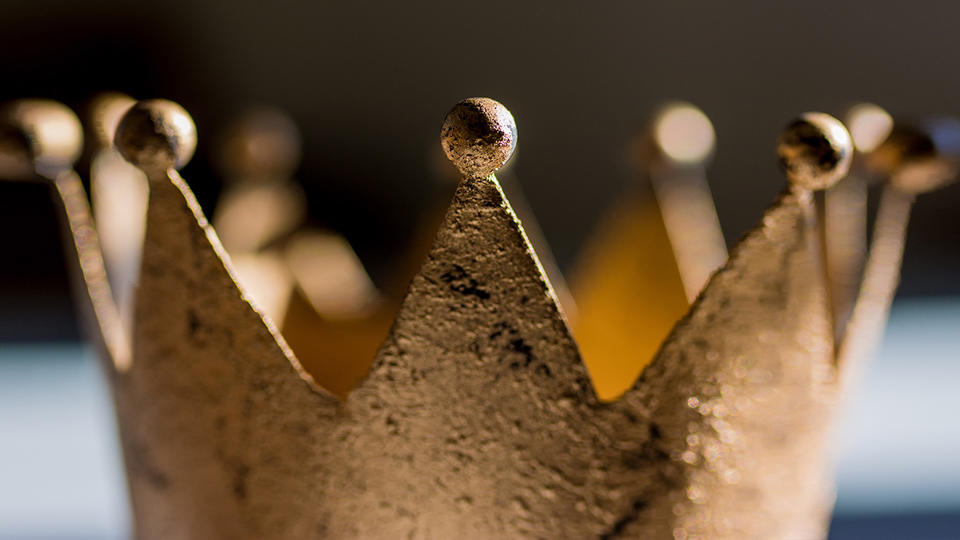 Closeup of a golden cardboard crown