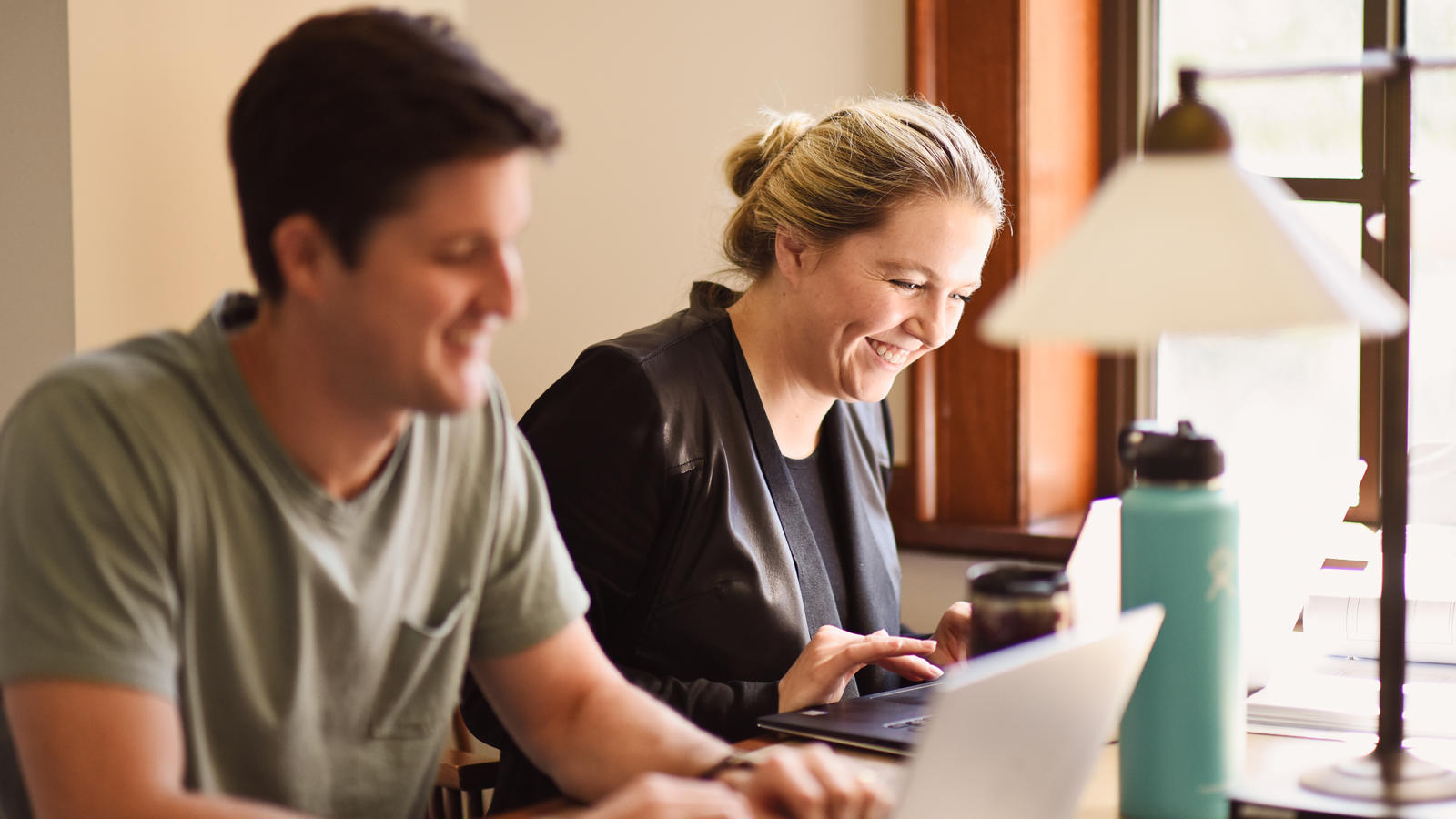 woman and man working together