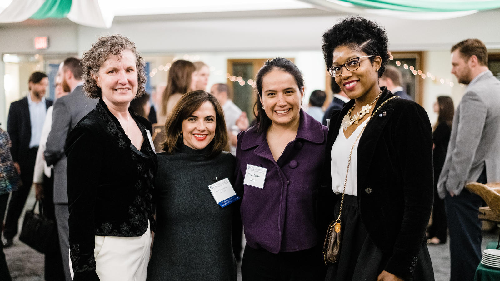 Four female alumni at alumni wine reception