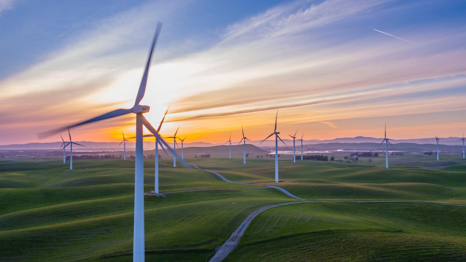 Wind turbines at sunset