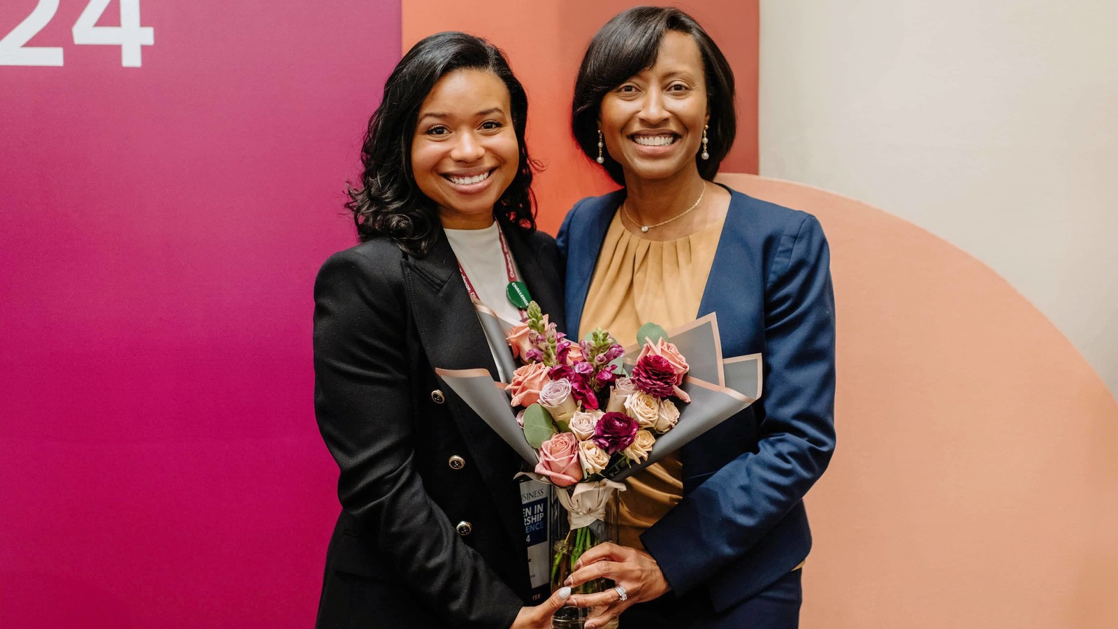 Two female Rice MBA students at the Women in Leadership conference