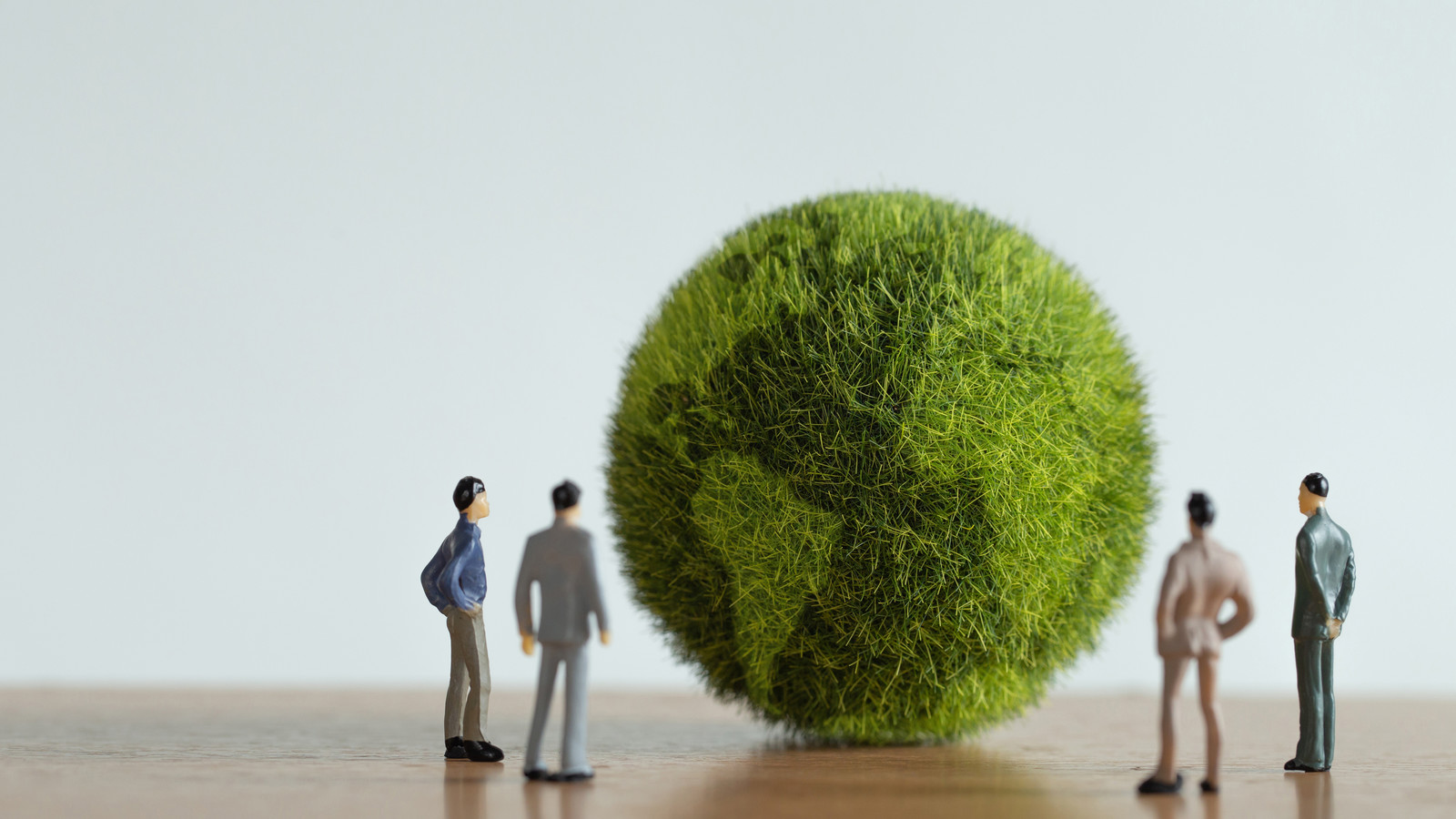 Small figurines and grass globe