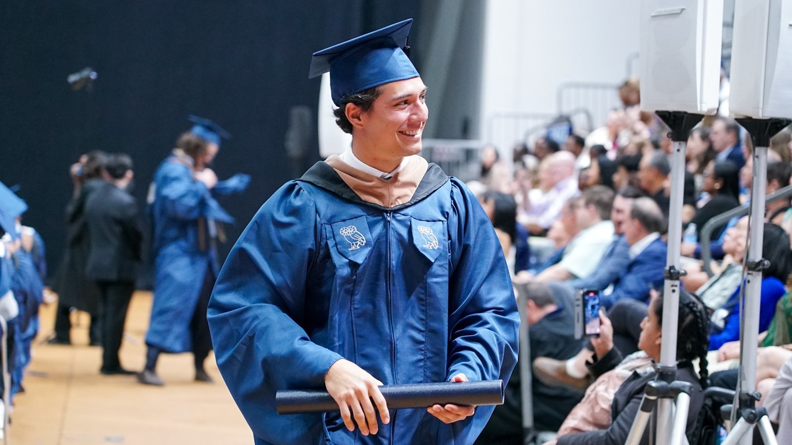 Rice MBA student at graduation