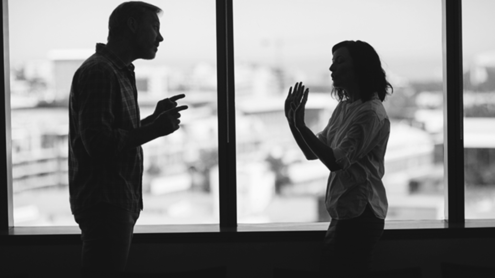 Man and woman disagreeing