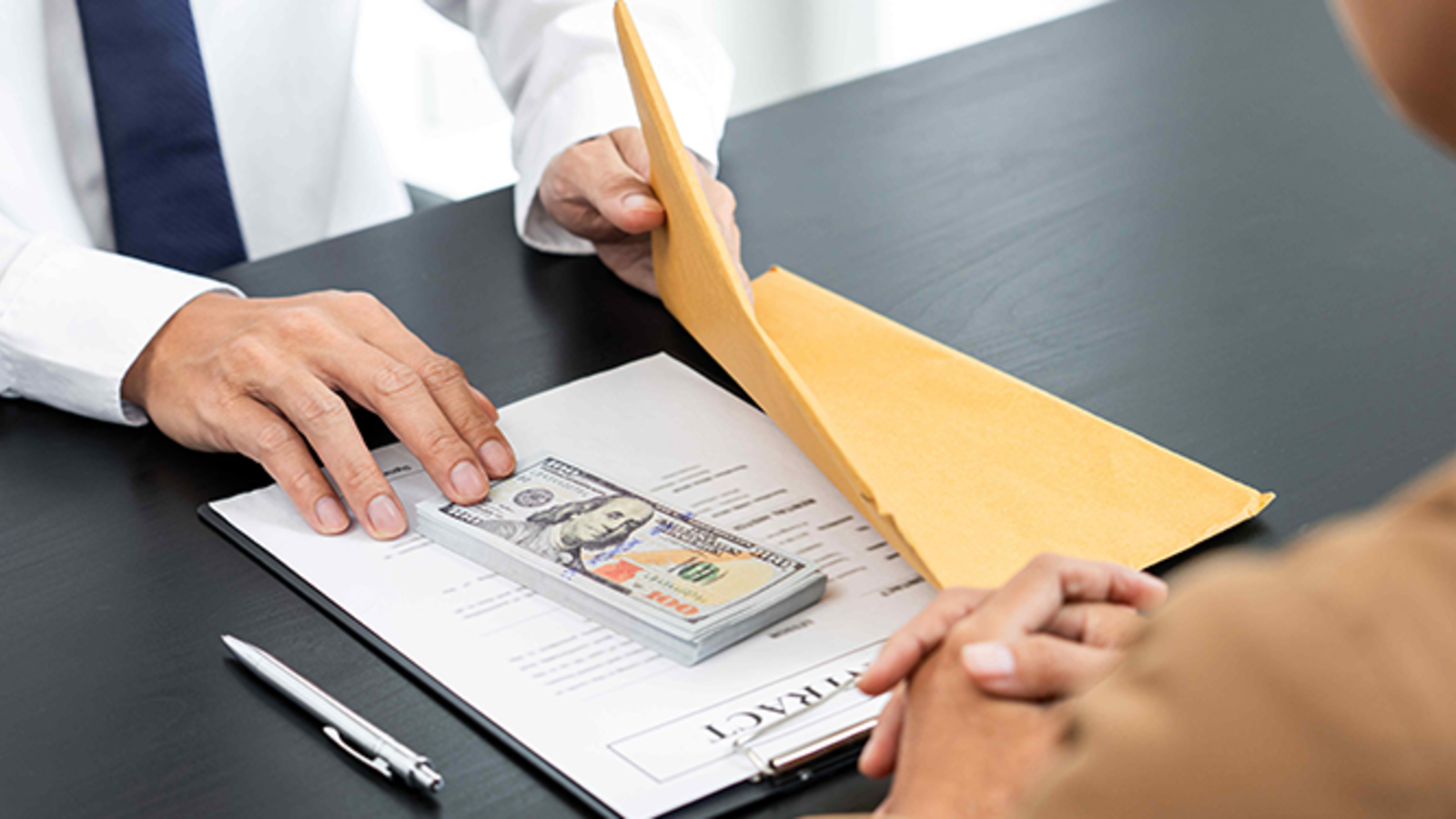 Exchange of money under envelope