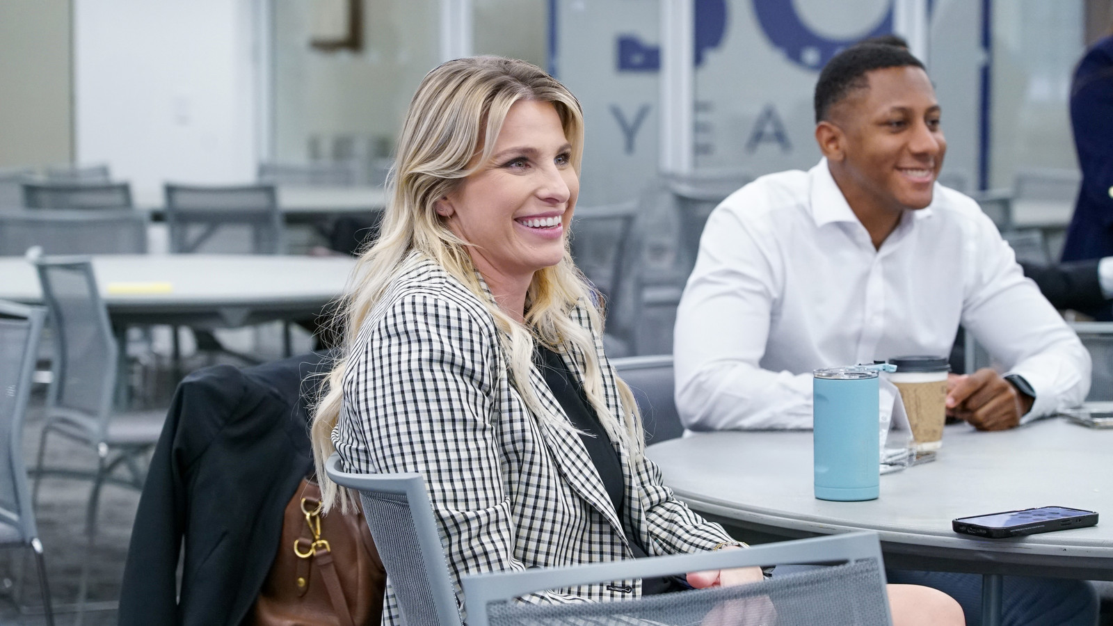 Two Rice Professional MBA (Part-Time) MBA students smiling