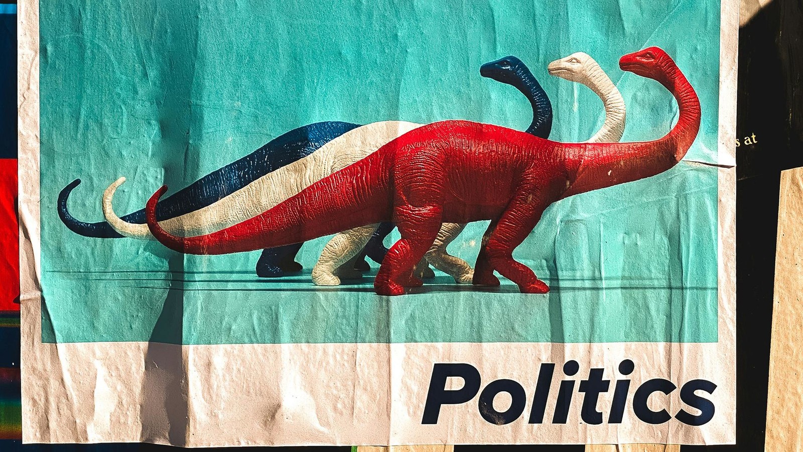 Poster of dinosaurs and the word Politics