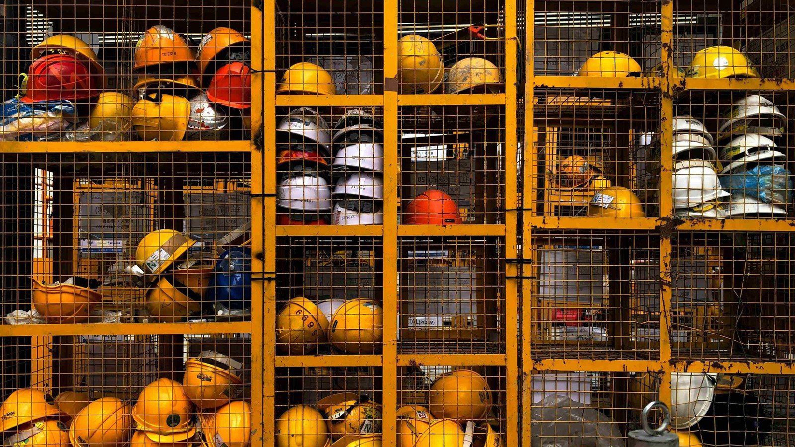 Grid cage containing safety hats