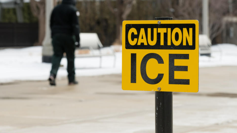 Caution ice sign, winter weather