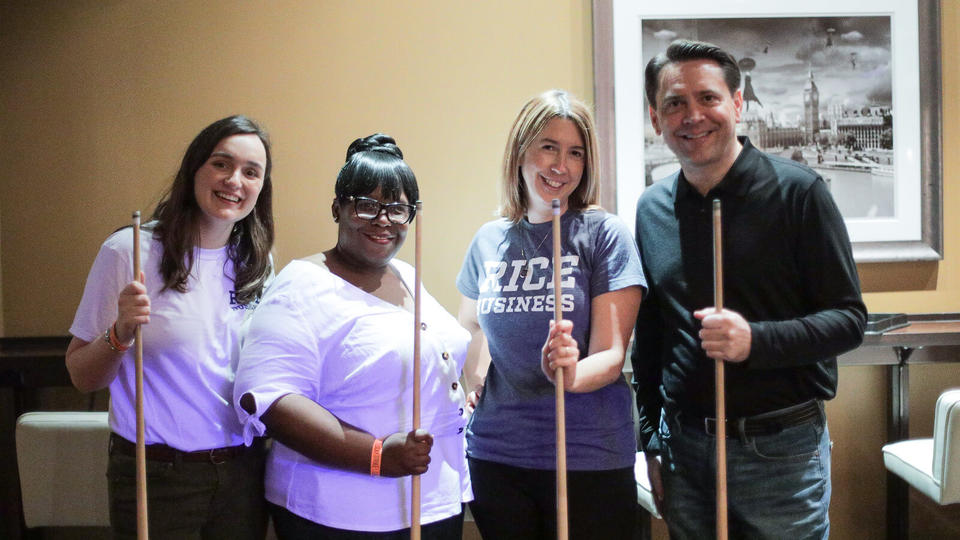 staff playing pool