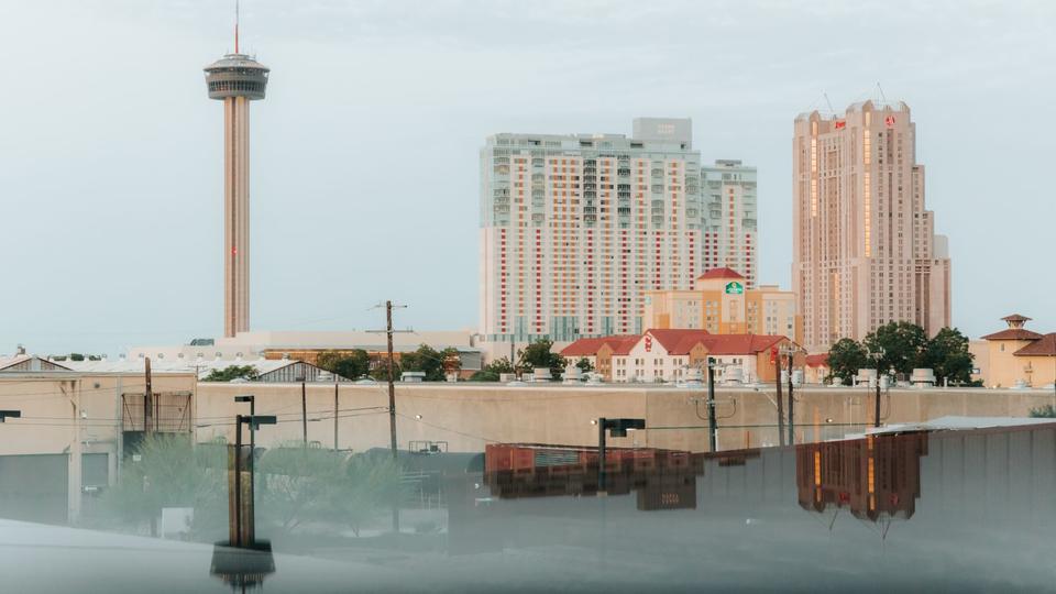 View of San Antonio Riverwalk skyline at golden hour