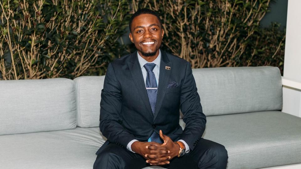 Brandon Johnson on a couch