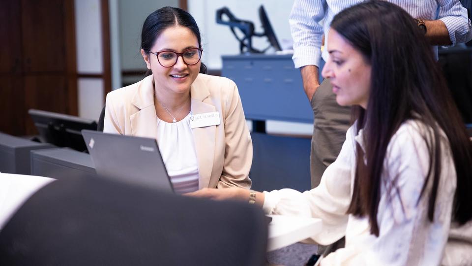 Students working together on a laptop