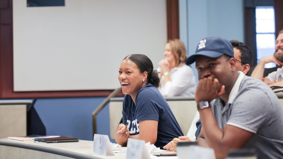 Students in classroom laughing