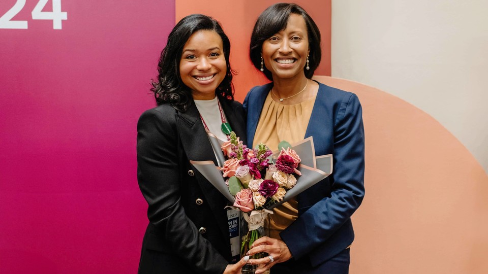 Two female Rice MBA students at the Women in Leadership conference