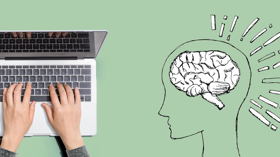 Laptop next to line drawing of human brain