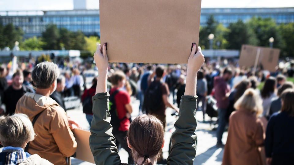 Protestor holding sign