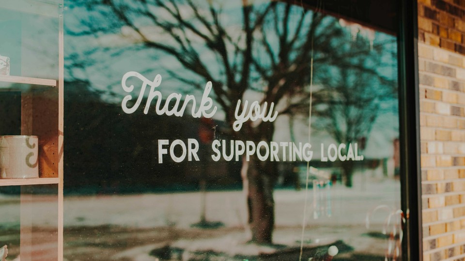 Window text says Thank you for supporting local