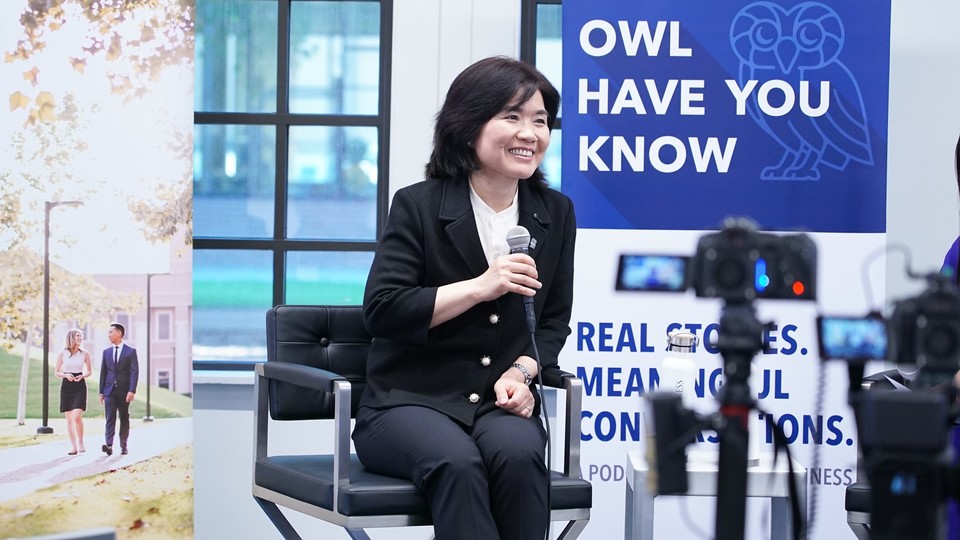 Anthea Zhang speaking at a Rice Business live podcast event