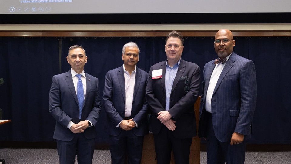 Symposium guest speakers in the Shell Auditorium
