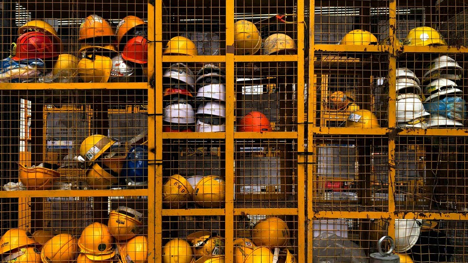 Grid cage containing safety hats
