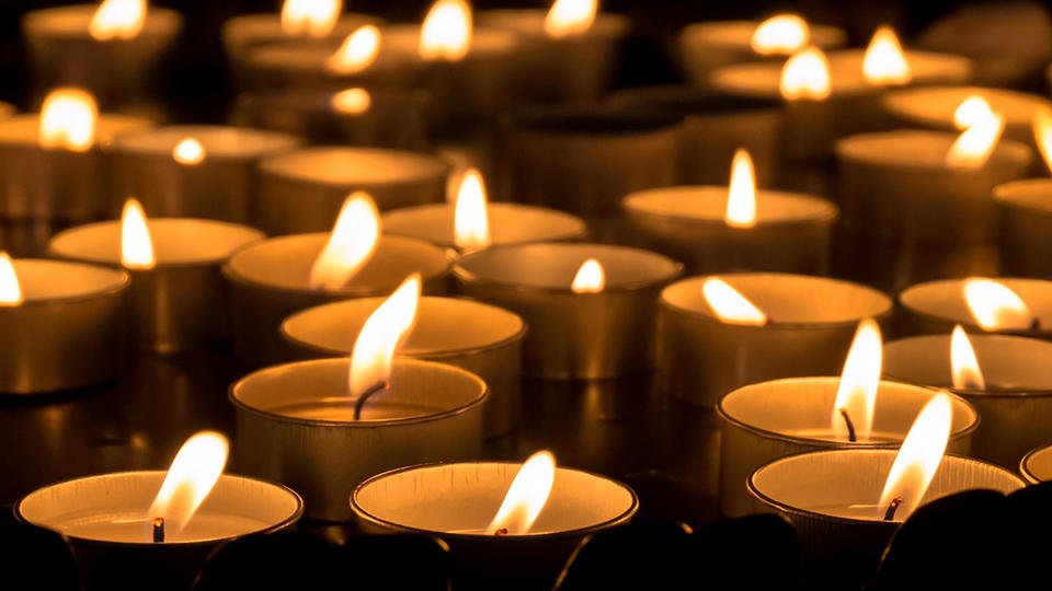 Group of tea candles burning