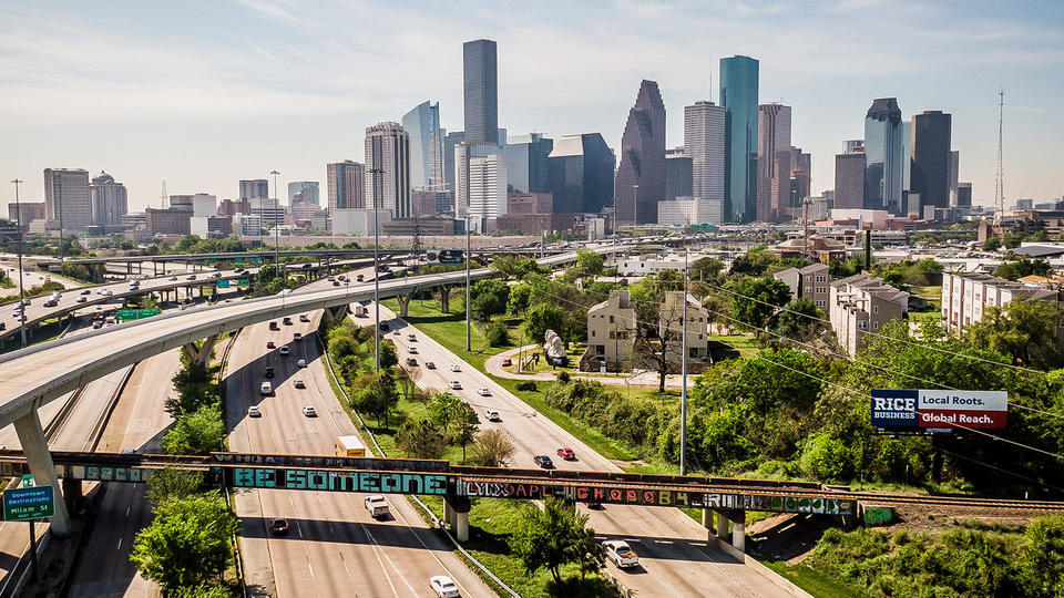 Rice Business Billboard with Houston Skyline