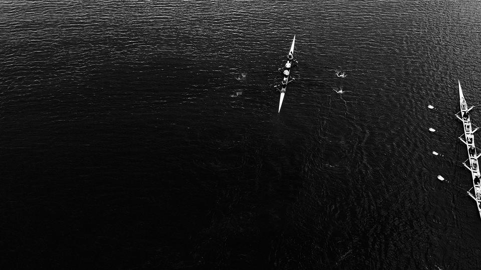 Overhead shot of three different row boat teams