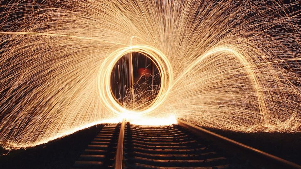 Time units humor Circle of sparks on a train track