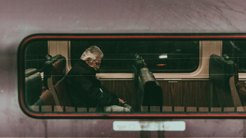 Man sitting in a train