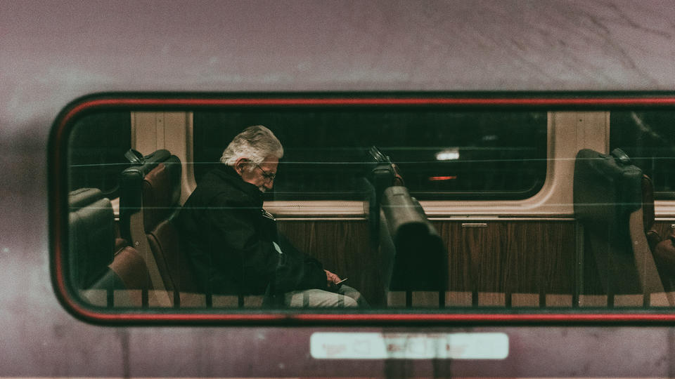 Man sitting in a train