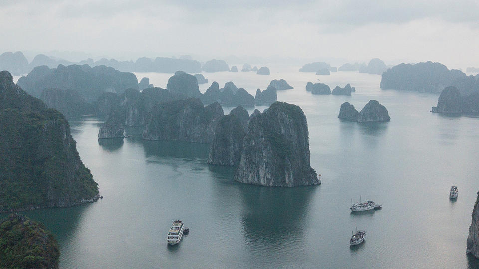 Boats on rocky water 