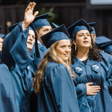 Woman smiling at investiture