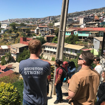 Student at GFE wearing a Houston Strong shirt looking at a view of a community