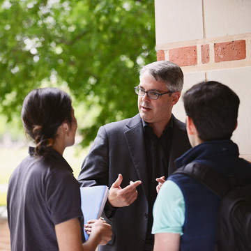 Professor Alex Butler with students