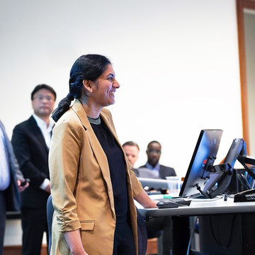 Female student presenting in the classroom