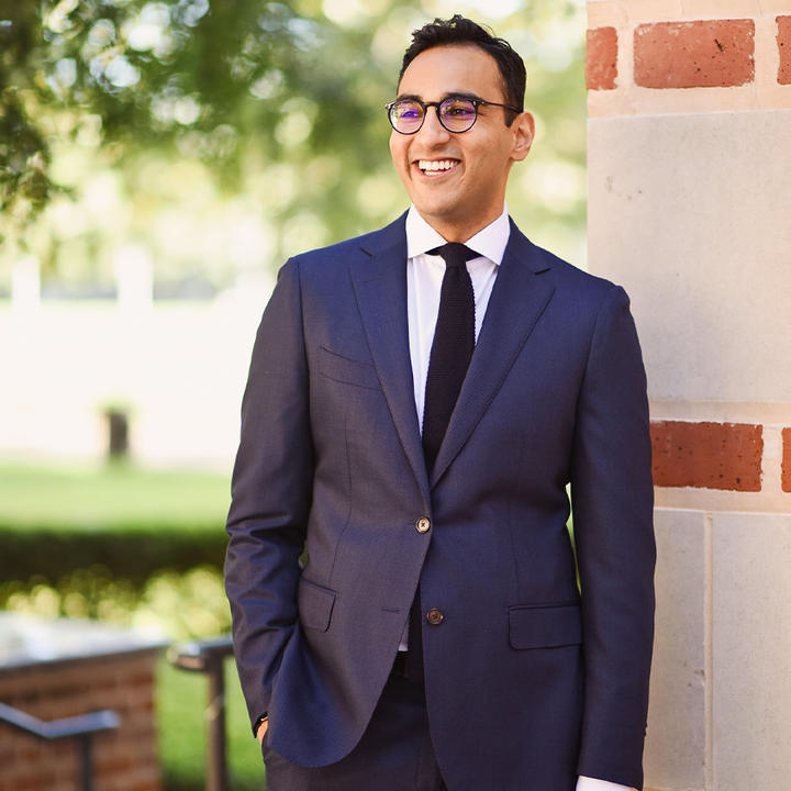 Kunal Sachdeva profile standing in suit