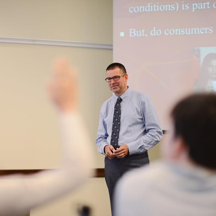 Professor Doug Schuler Teaching In Class