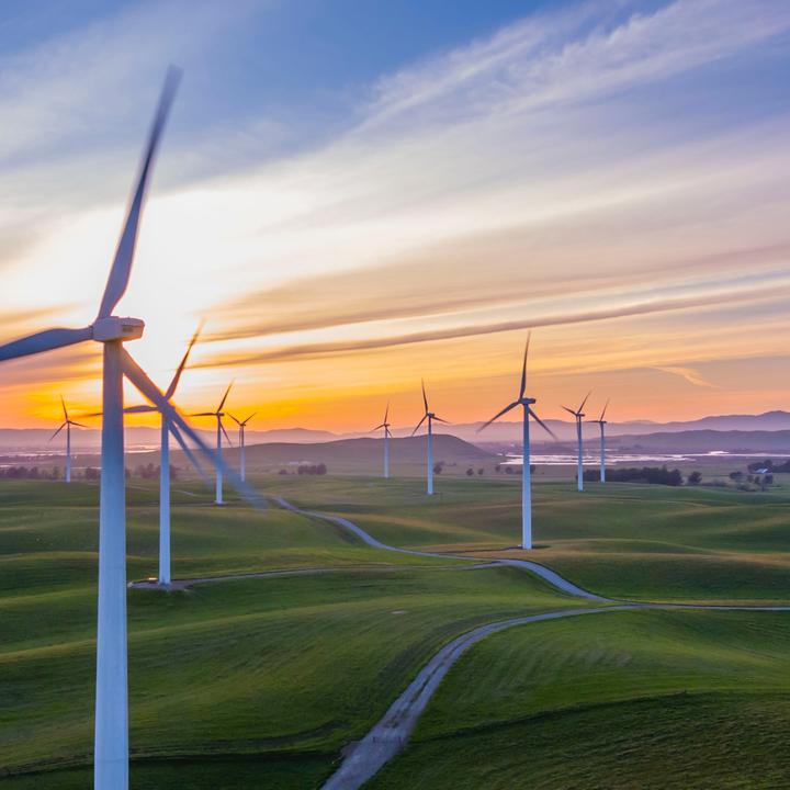 Wind turbines at sunset
