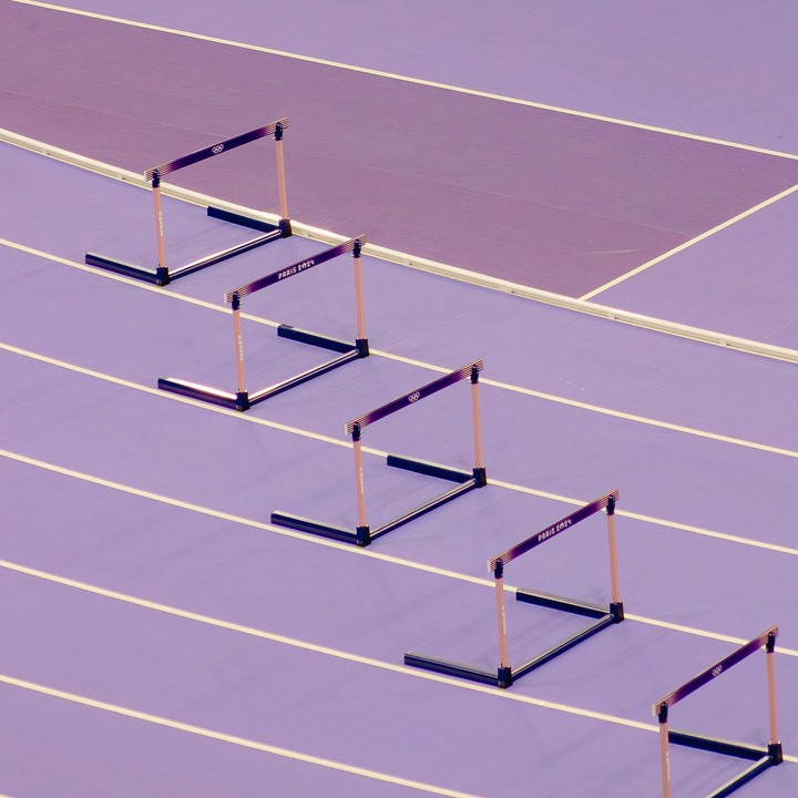 Hurdles on race track.